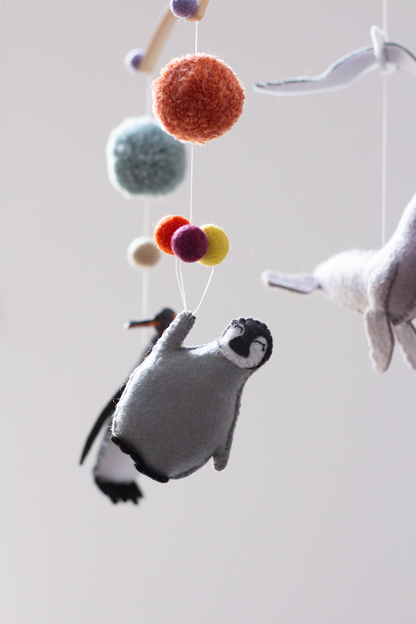 Penguin Party hanging mobile featuring penguins from around the world
