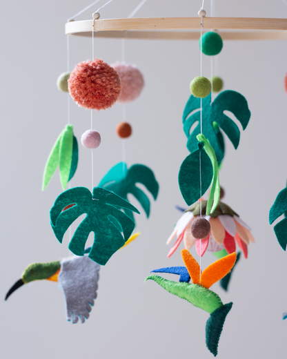 Close-up of handcrafted African wildlife animals and foliage on the Big Five Classic Hoop Mobile.