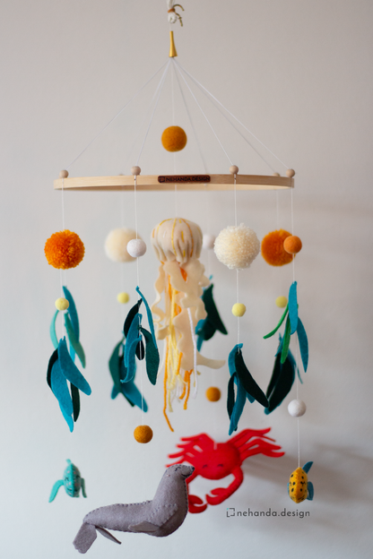 Decorative marine life hanging mobile with seal, crab and fish