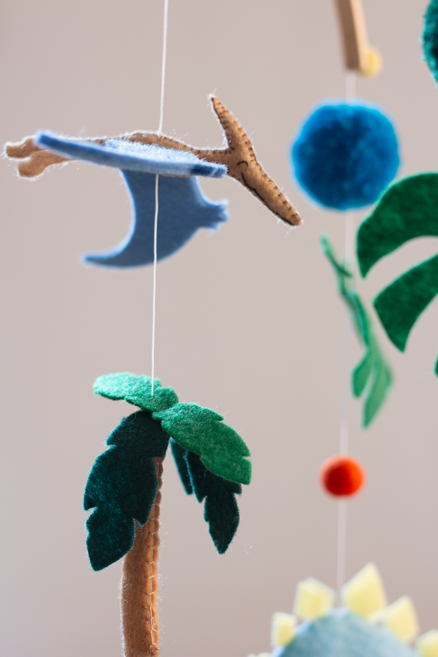 Dinosaur hanging mobile inspired by the prehistoric world