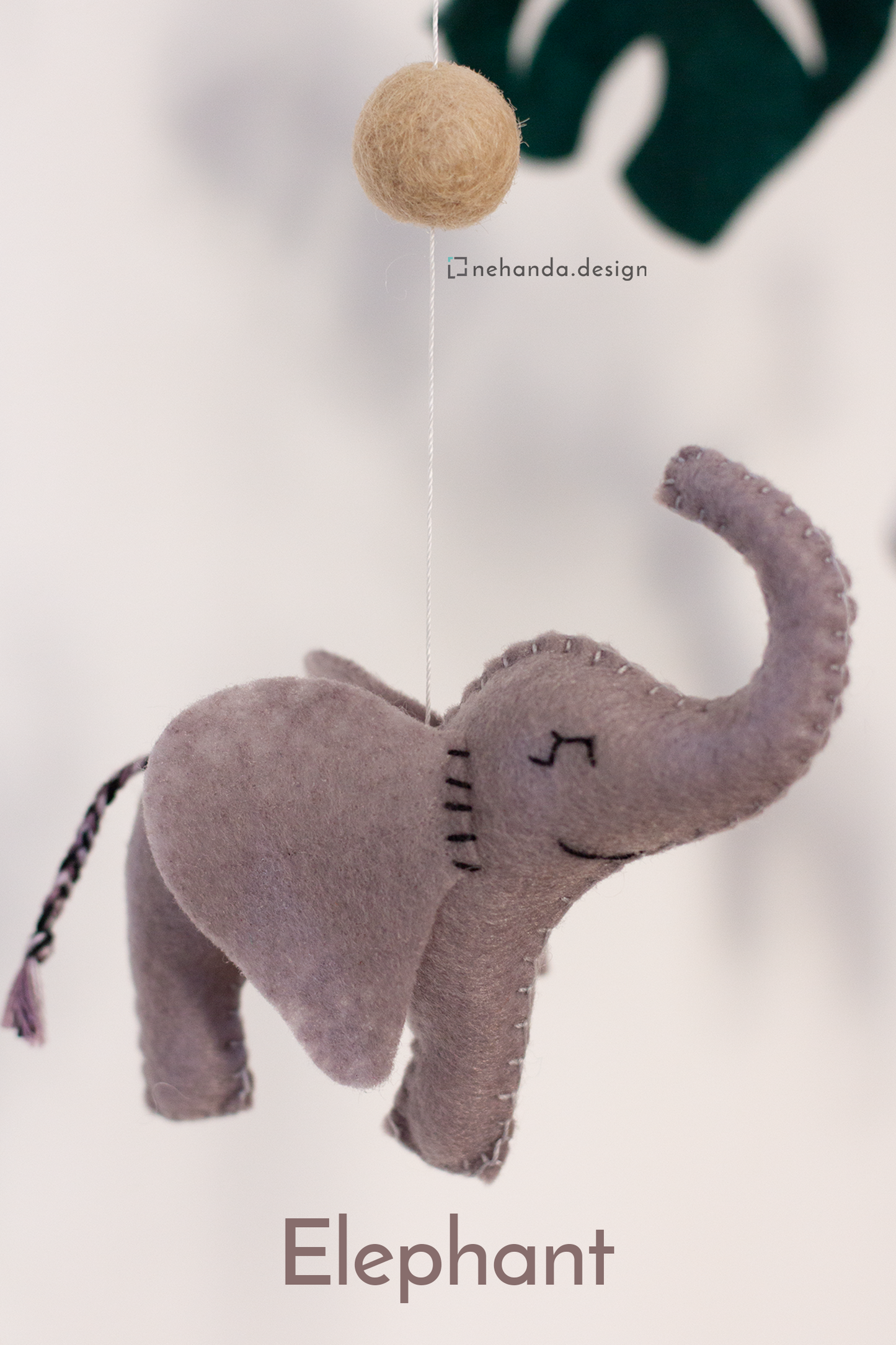 Handcrafted Big Five hanging mobile featuring elephant,