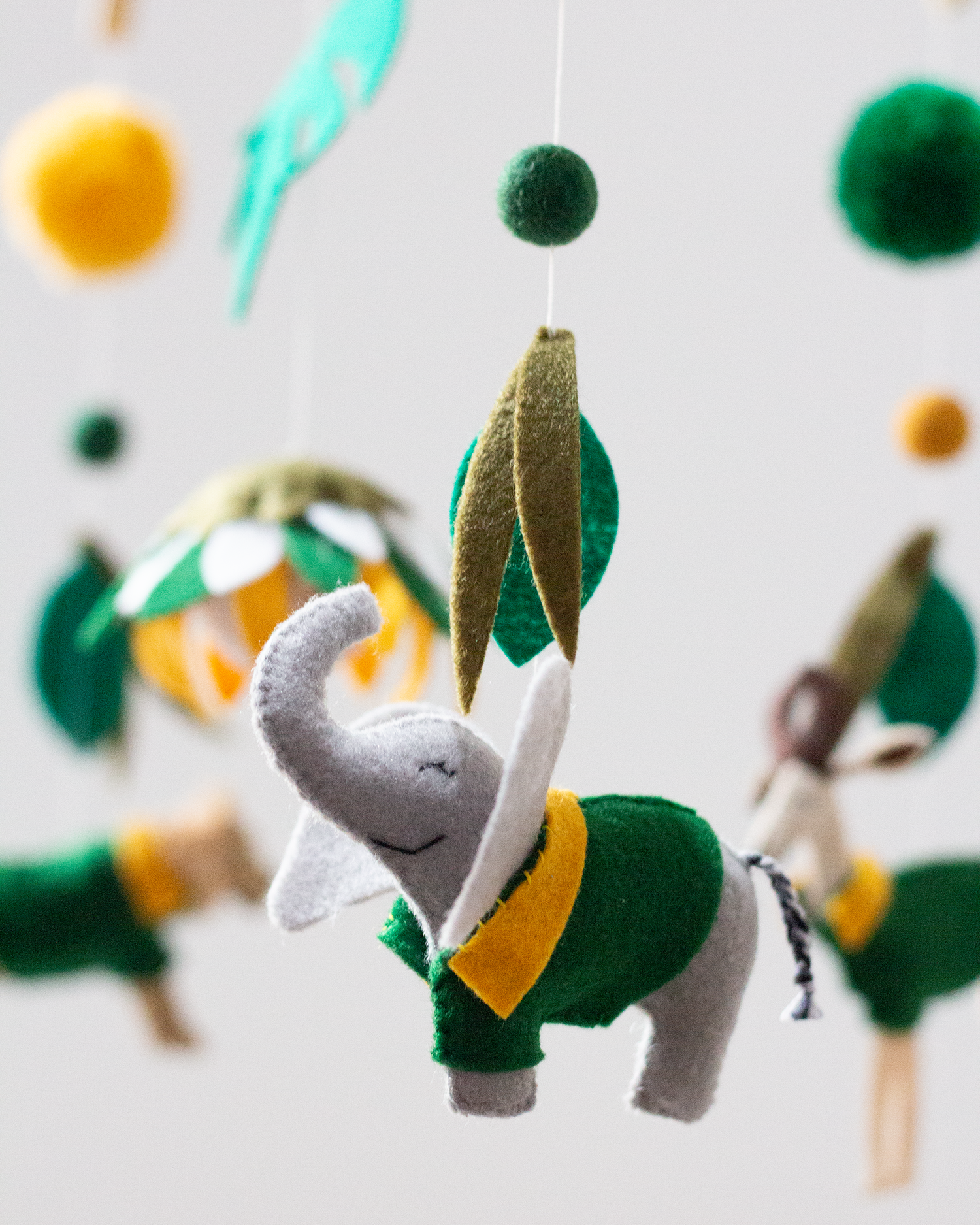 Handmade South African Signature Arch mobile in green and gold with elephant
