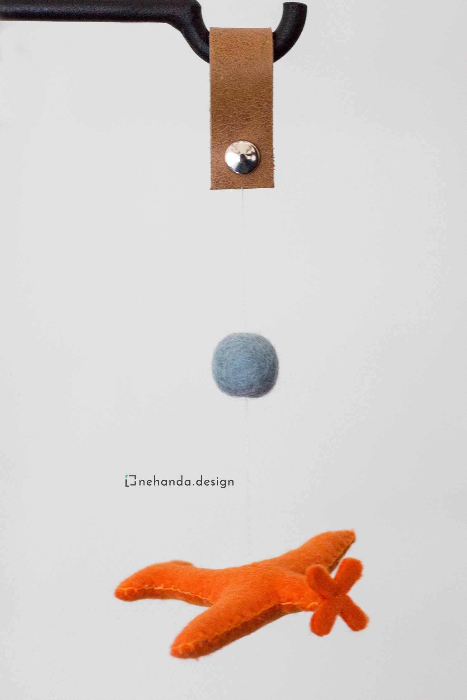 Decorative felt bag charms with reclaimed leather straps